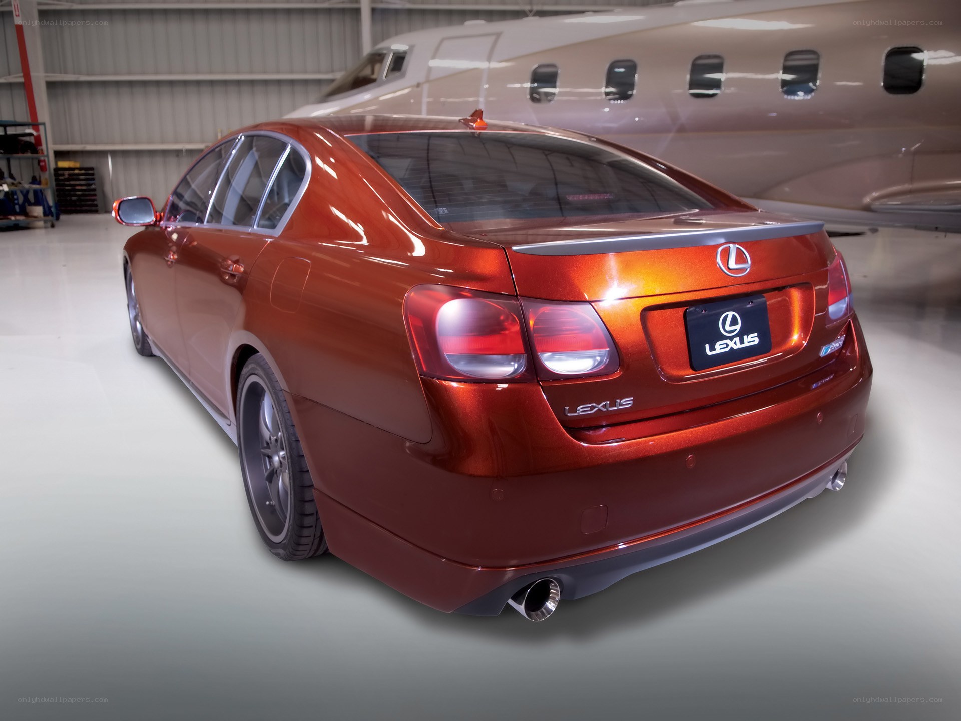 Red Lexus in hangar