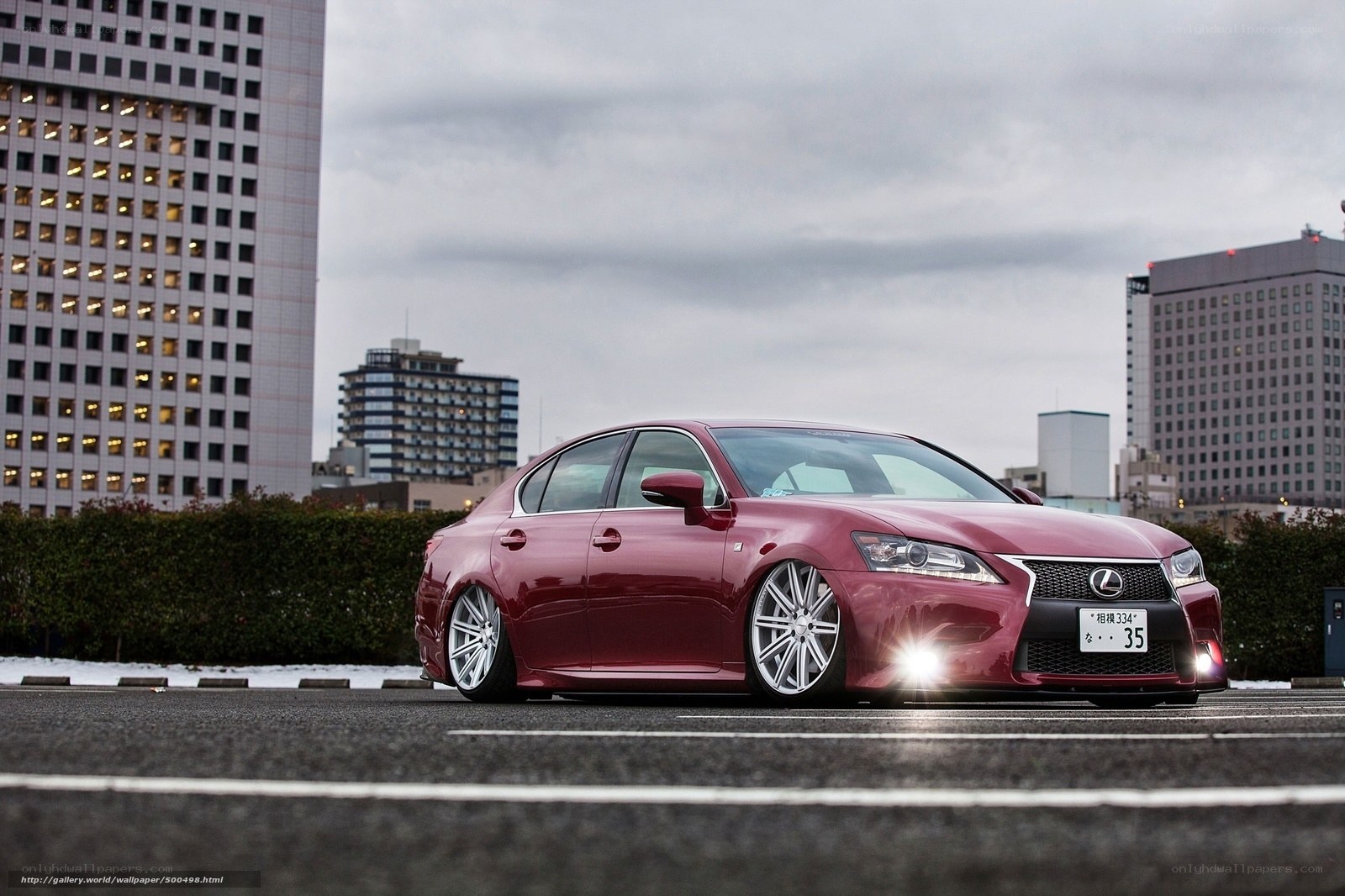 Red Lexus in urban setting