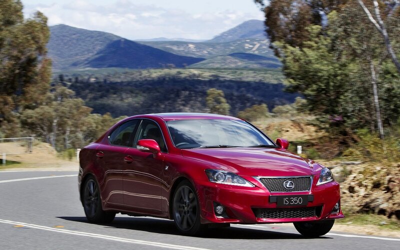 Red Lexus IS 350 on a scenic road