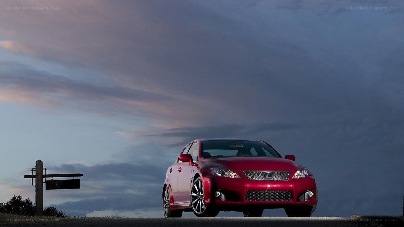 Red Lexus IS at dusk