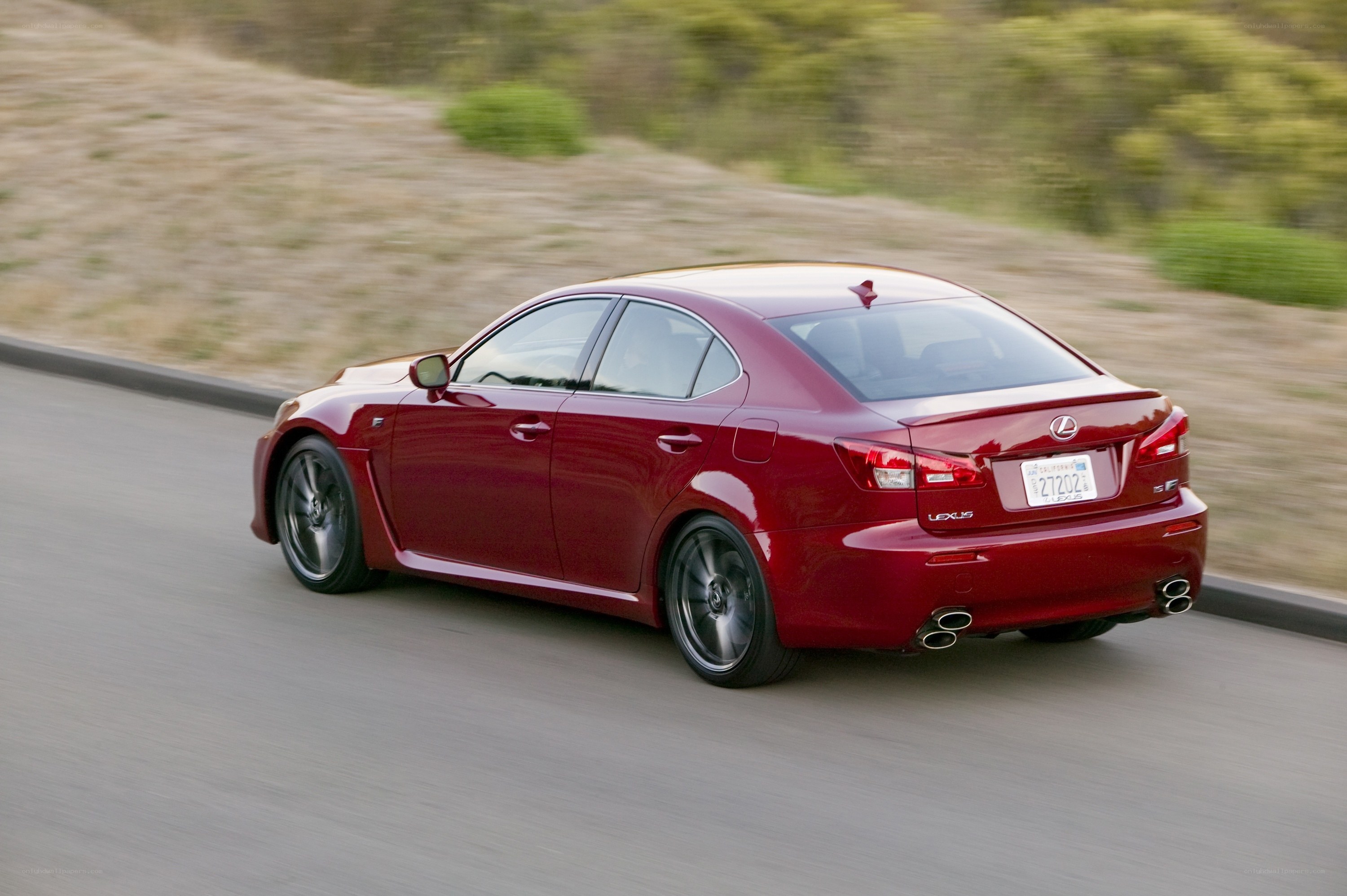 red lexus isf in motion