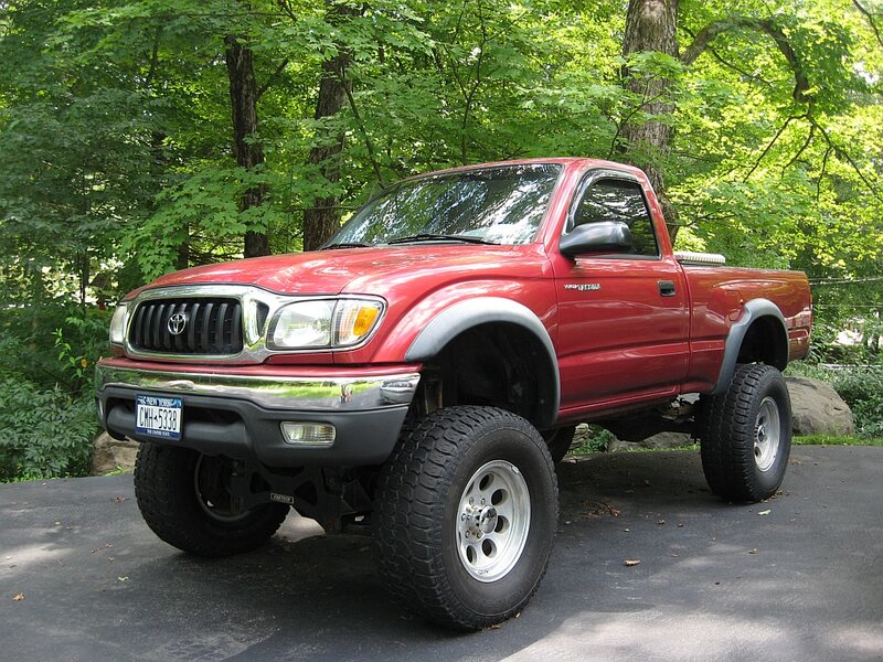 Red Lifted Pickup Truck — Natural