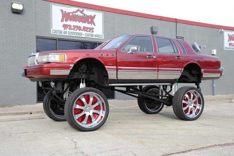Red Lifted Sedan