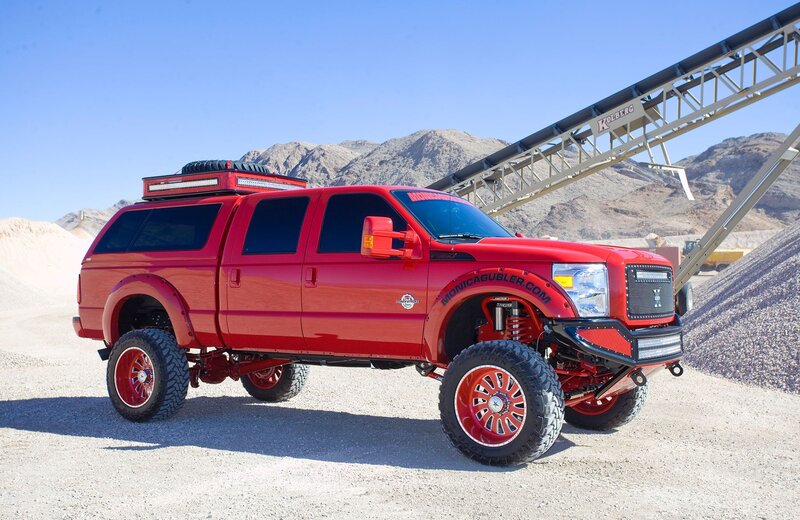 Red Lifted Truck — Dramatic, Afternoon, Photograph