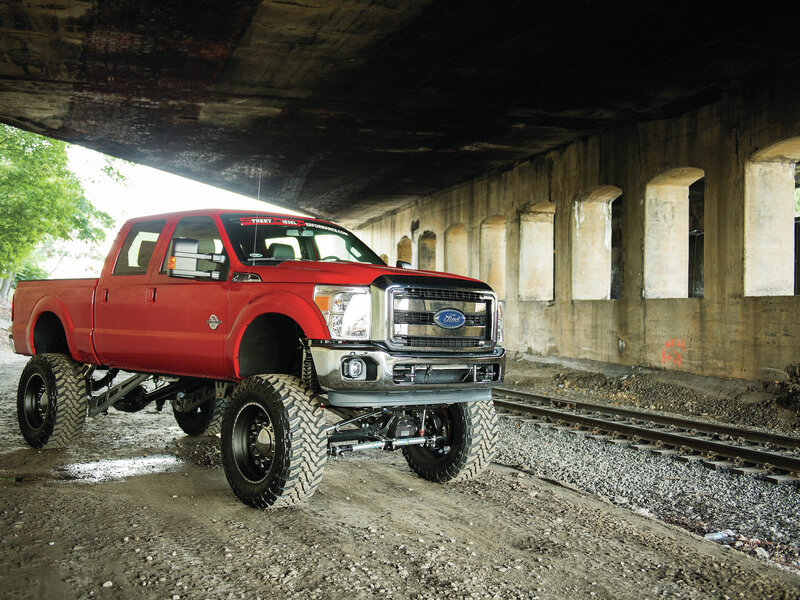 Red Lifted Truck — Dramatic, Afternoon