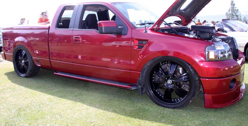 Red Lifted Truck — Outdoor