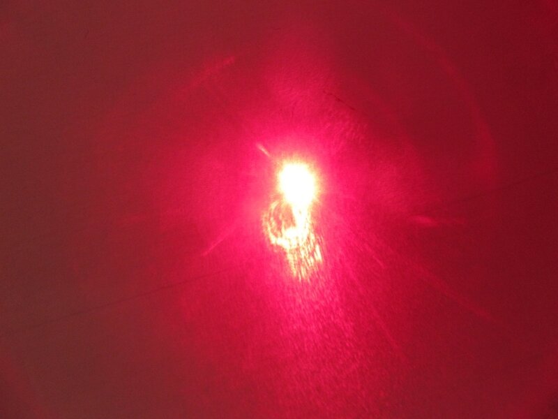 red light on dark surface