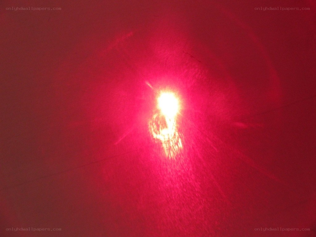 red light on dark surface