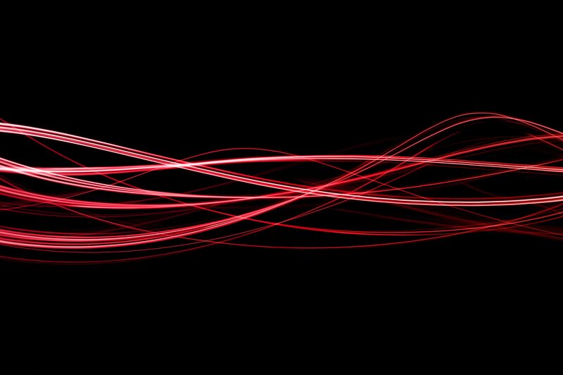 Red light trails on black