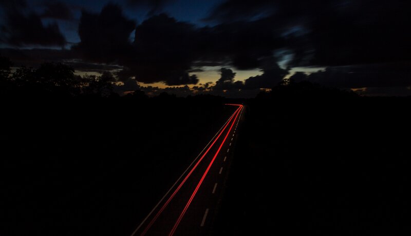 Red Light Trails on Road — Black, Dramatic, Night