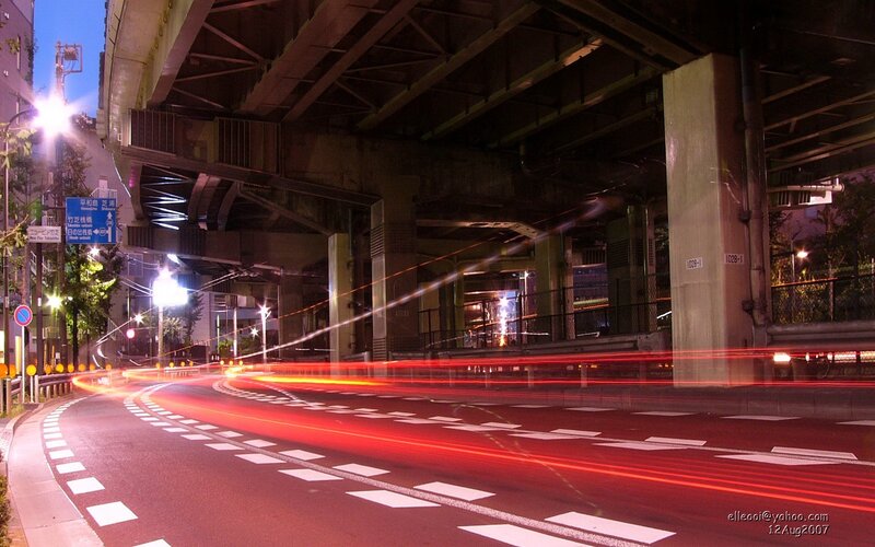 Red Light Trails on Road — Dramatic