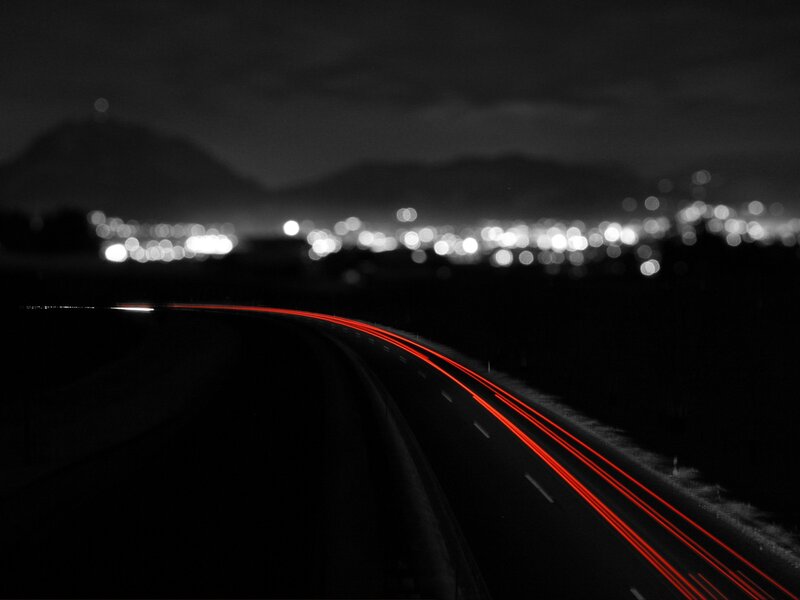 Red Light Trails on Road — Night