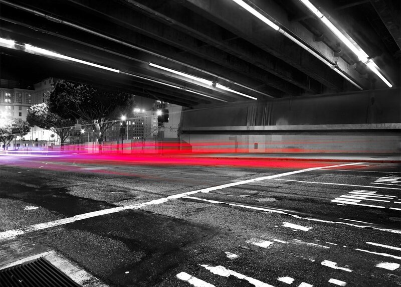 Red light trails under highway