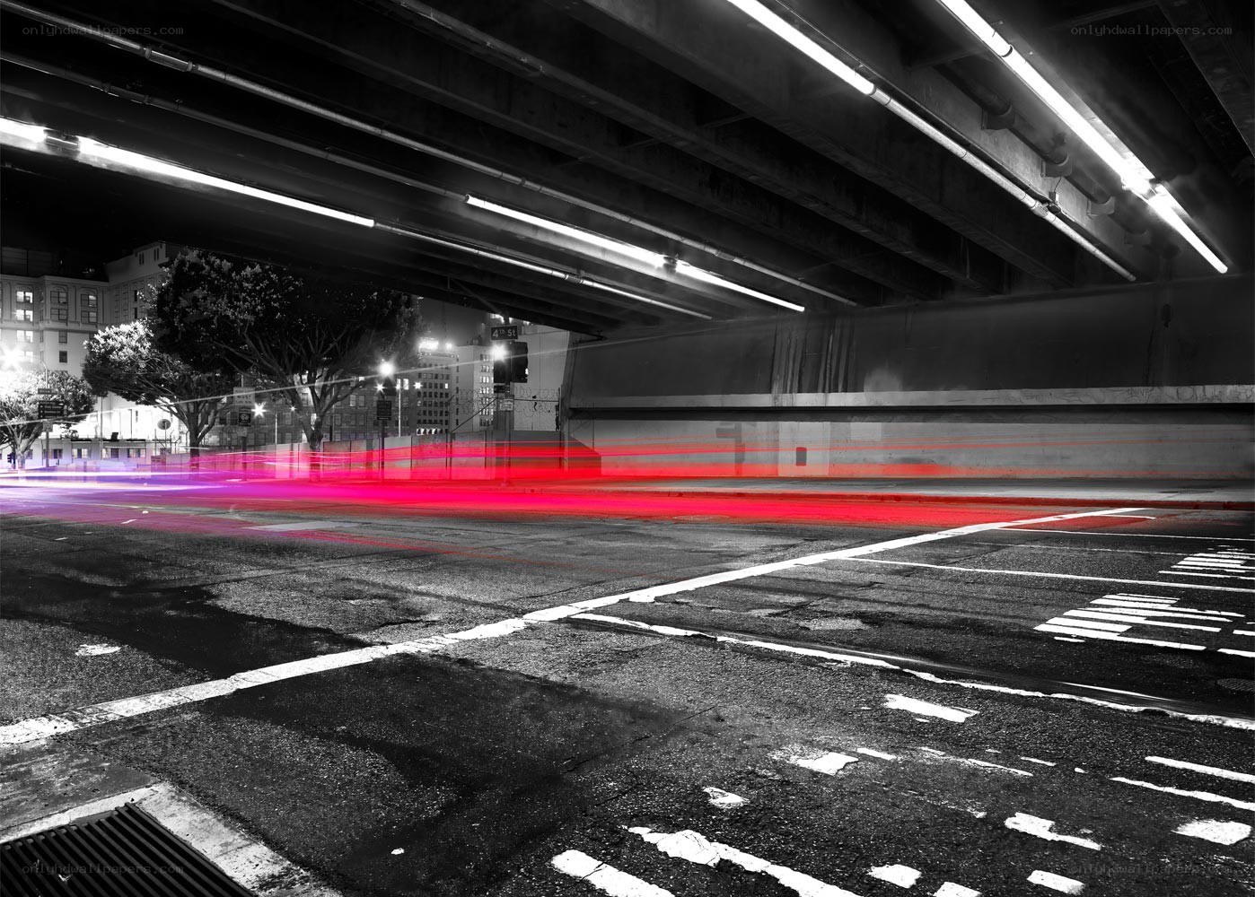 Red light trails under highway