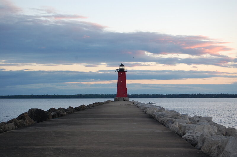 Red lighthouse at sunset