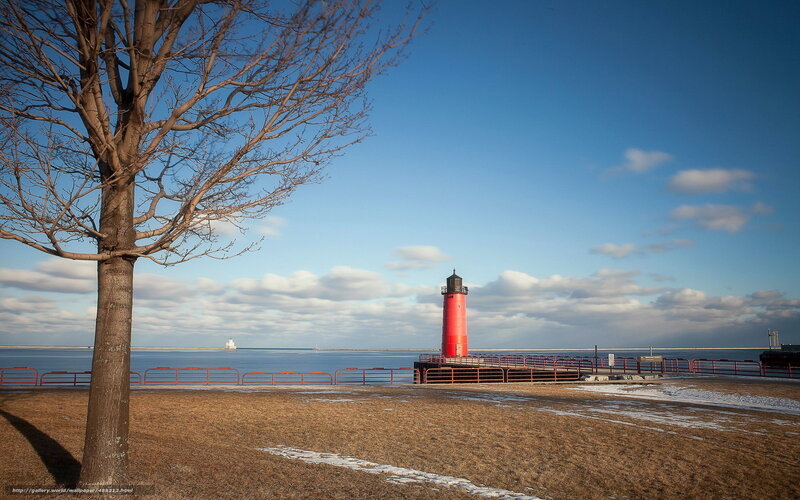 Red lighthouse by the water
