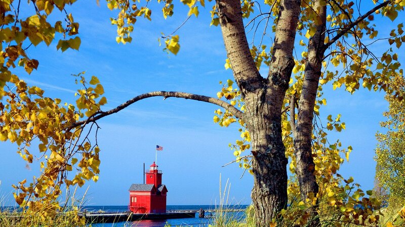 Red lighthouse in autumn