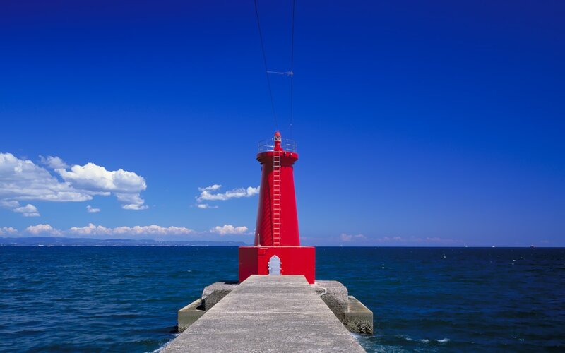Red lighthouse on a pier