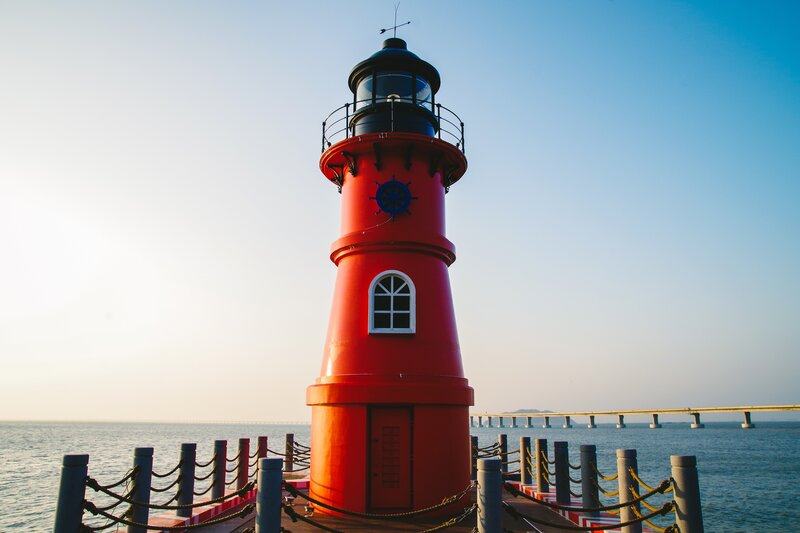 Red lighthouse on a pier