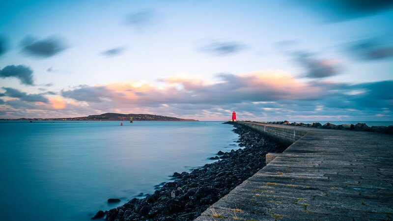 Red Lighthouse on Pier — Blue, Serene, Sunset