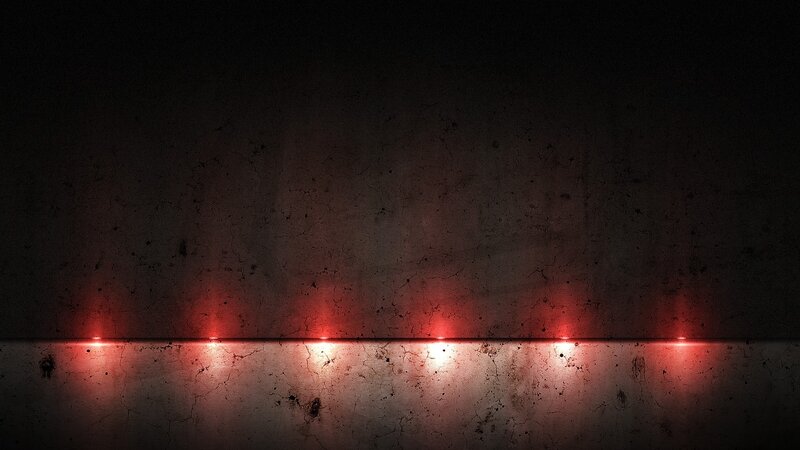 Red Lights on Concrete Wall — Dark, Dramatic