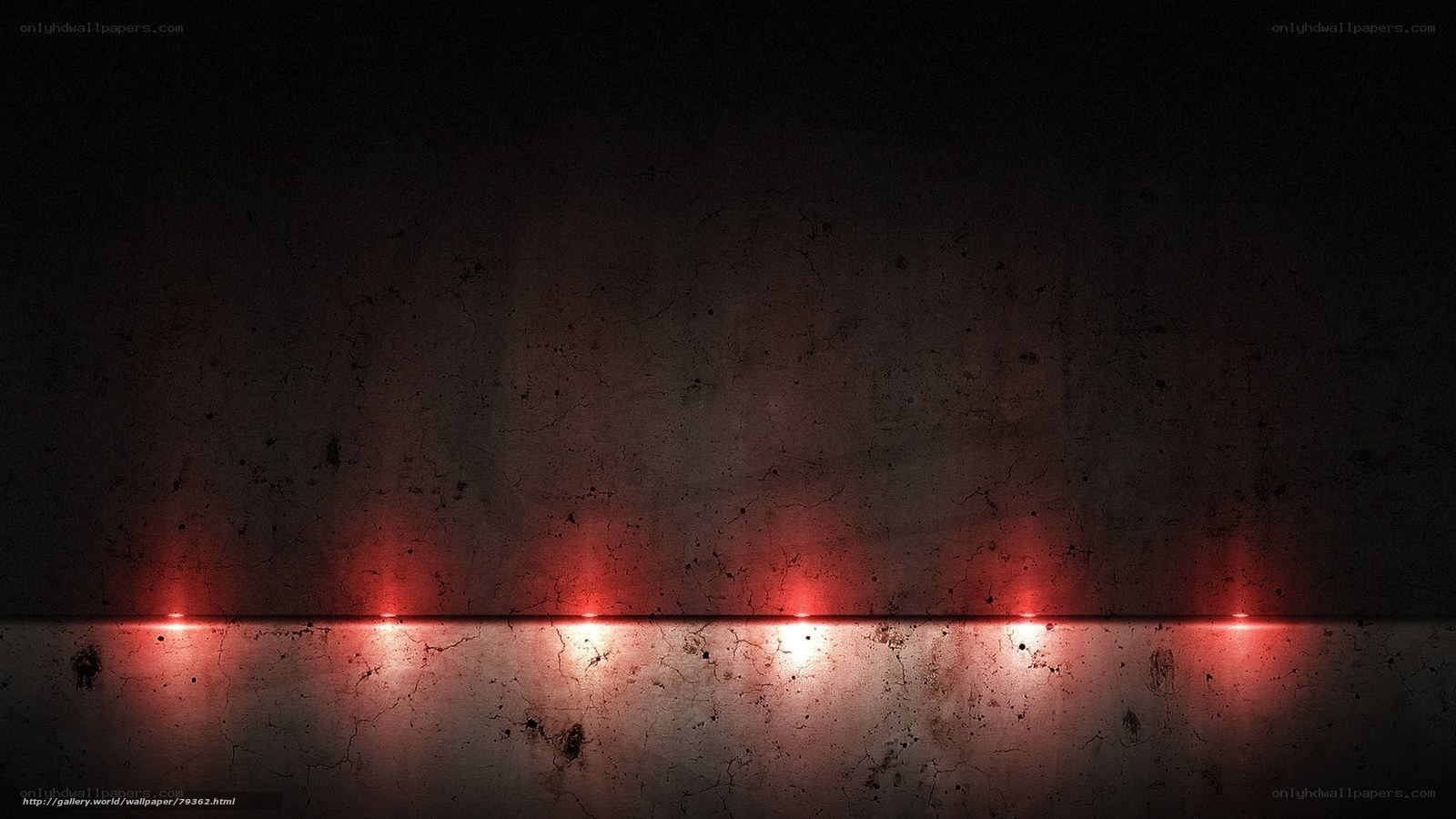 Red lights on concrete wall