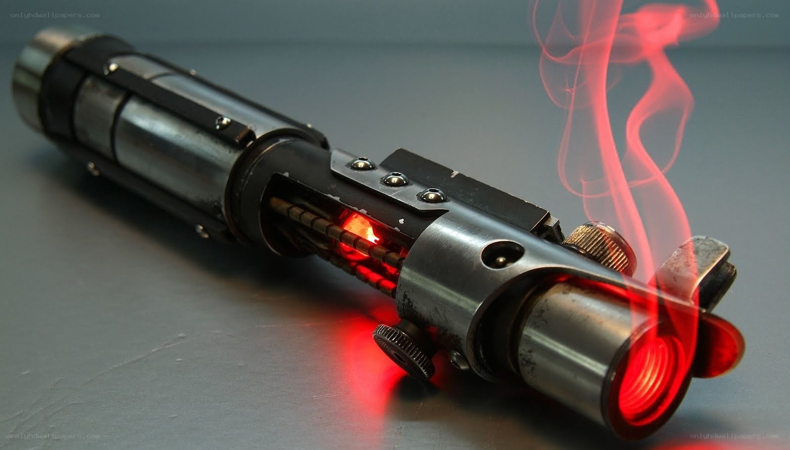 red lightsaber with smoke