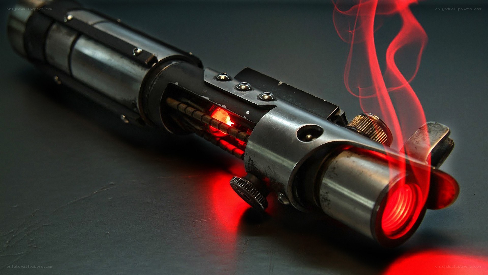 red lightsaber with smoke