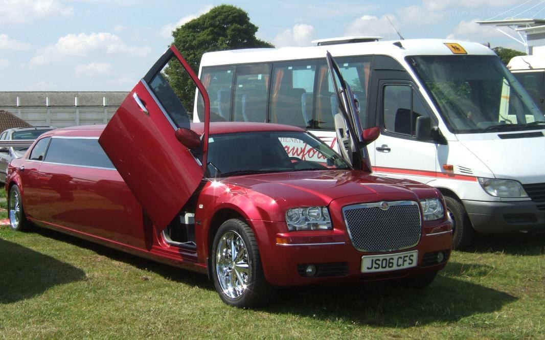 Red limousine with open doors