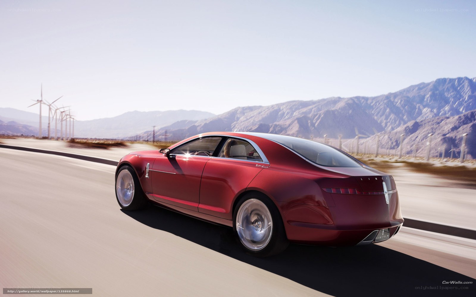 Red Lincoln concept car on road