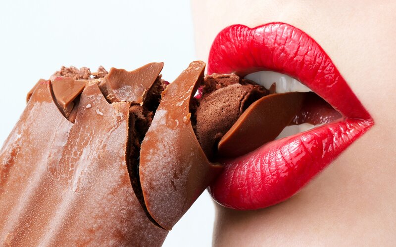 Red Lips Eating Chocolate