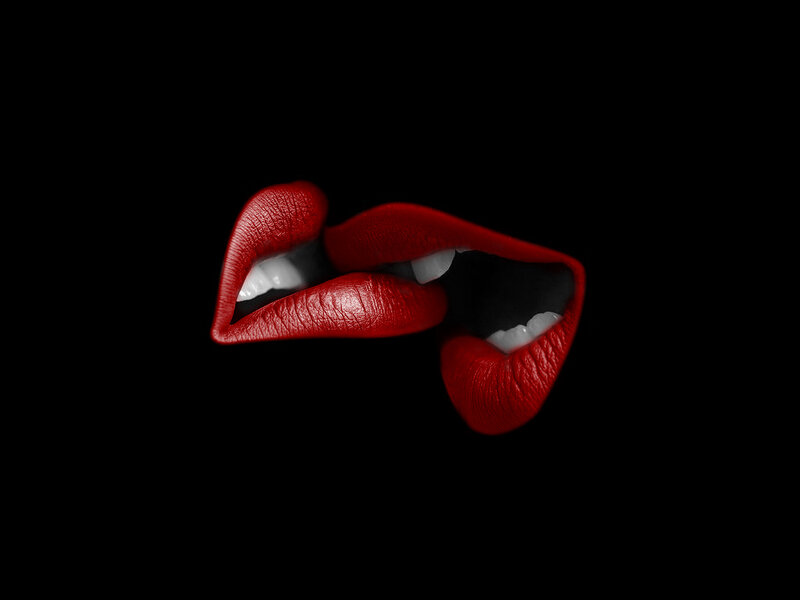 red lips on black background