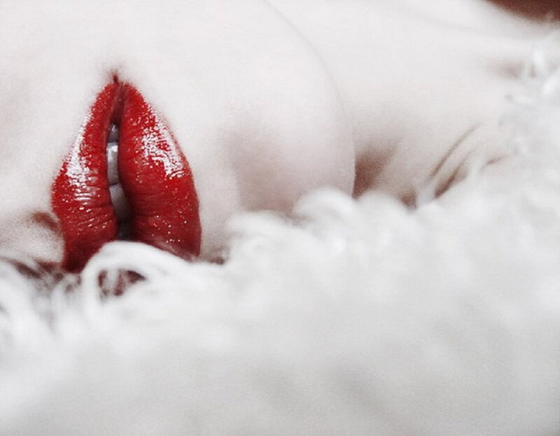 Red Lips on White Surface