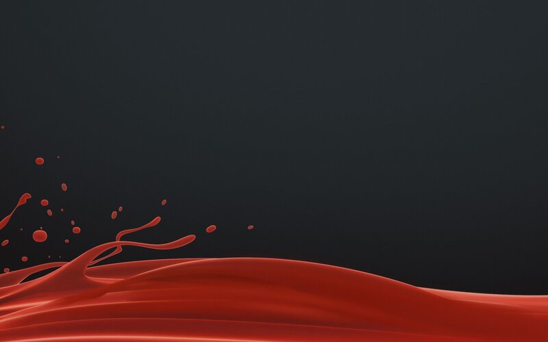 red liquid splash on dark background