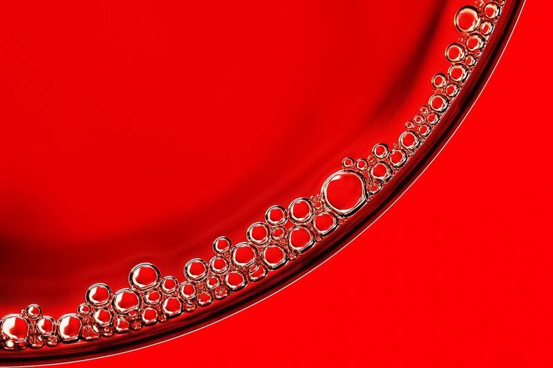 Red liquid with bubbles