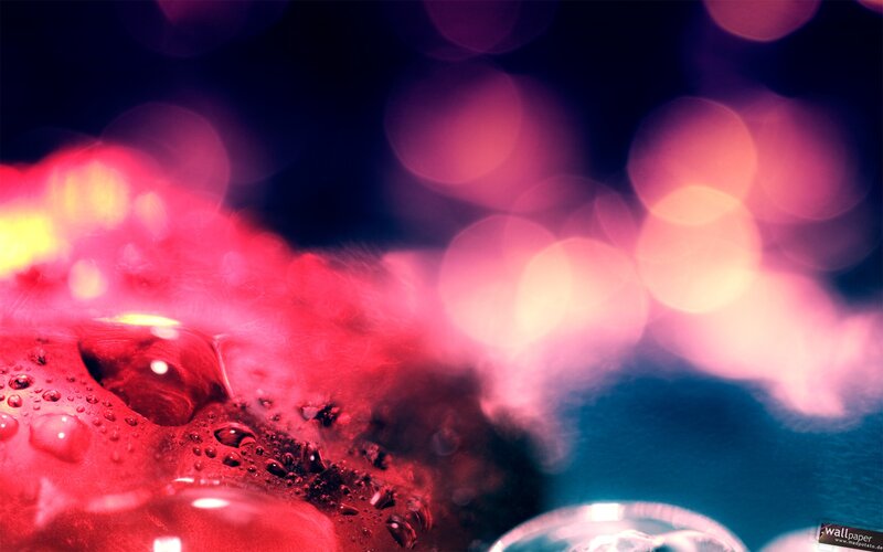 Red Liquid with Water Droplets