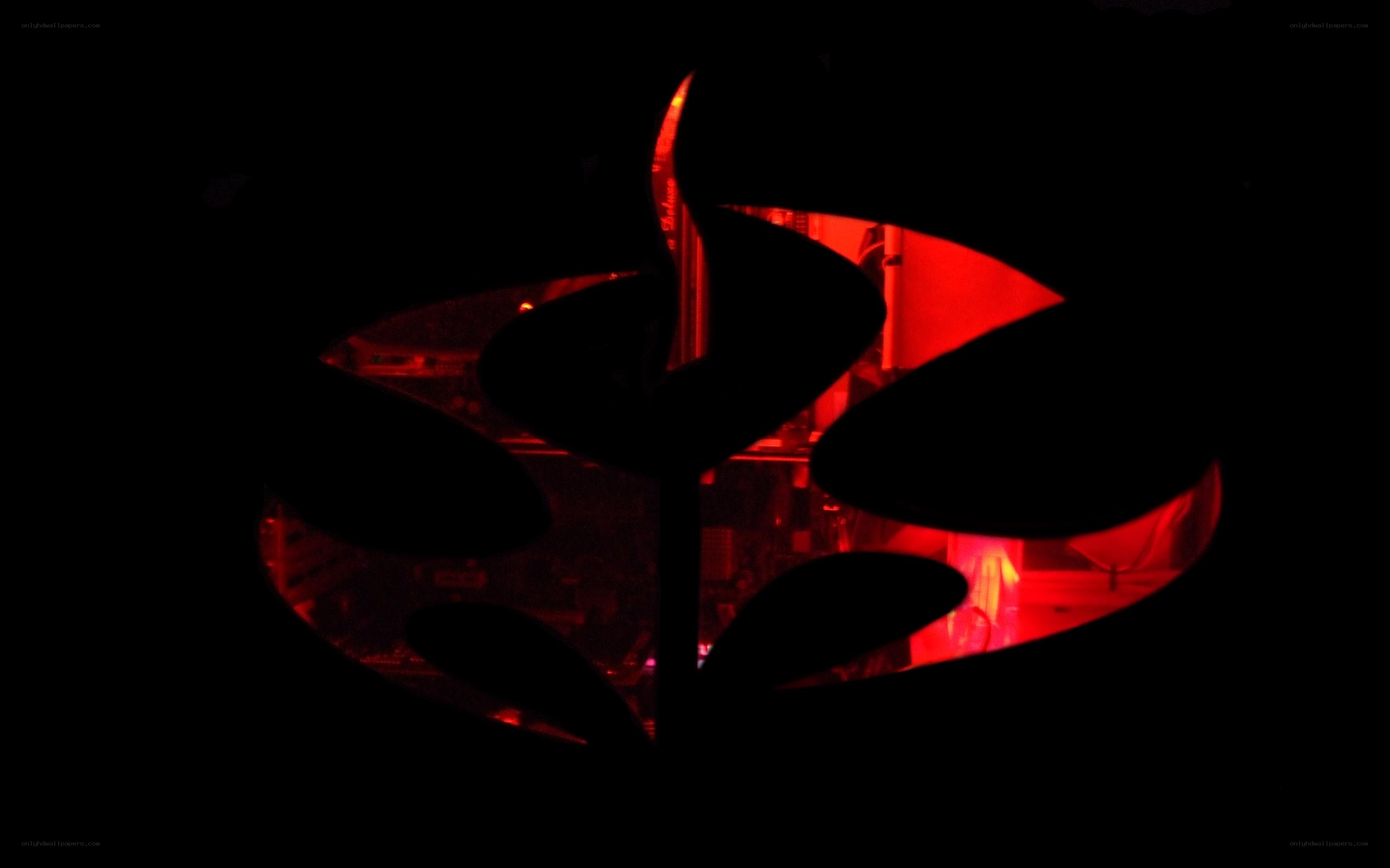 Red-lit abstract sculpture