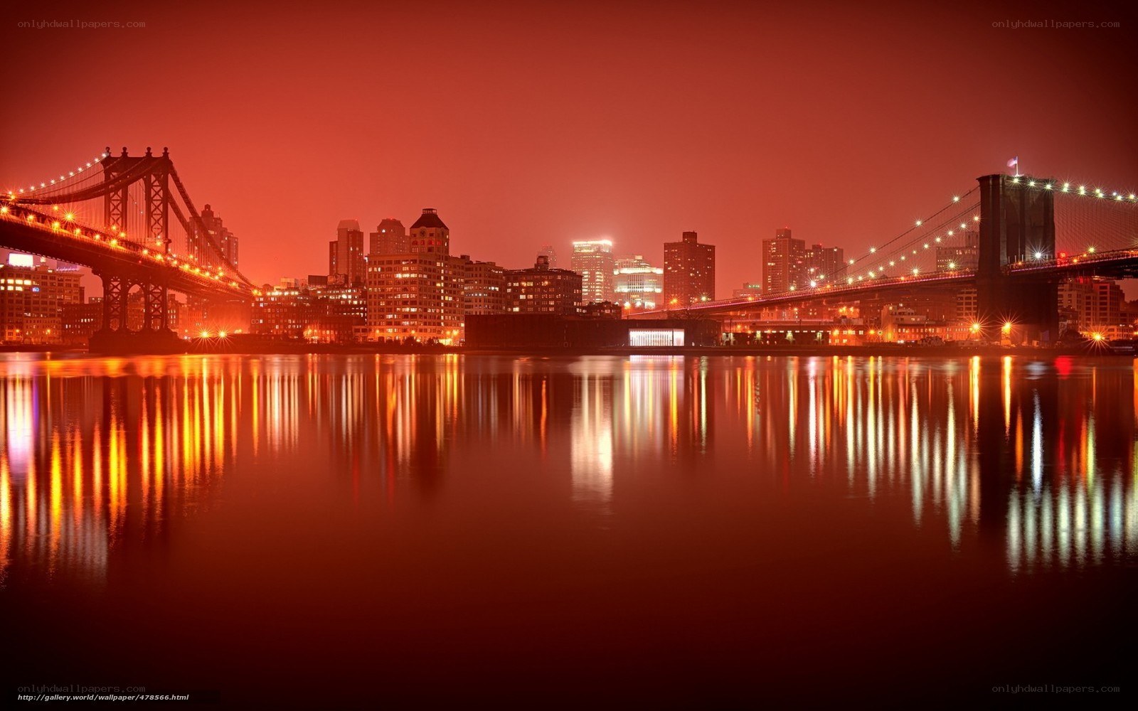 Red-lit city skyline at night