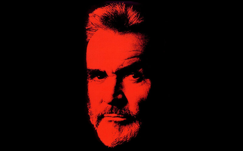 red-lit man's face
