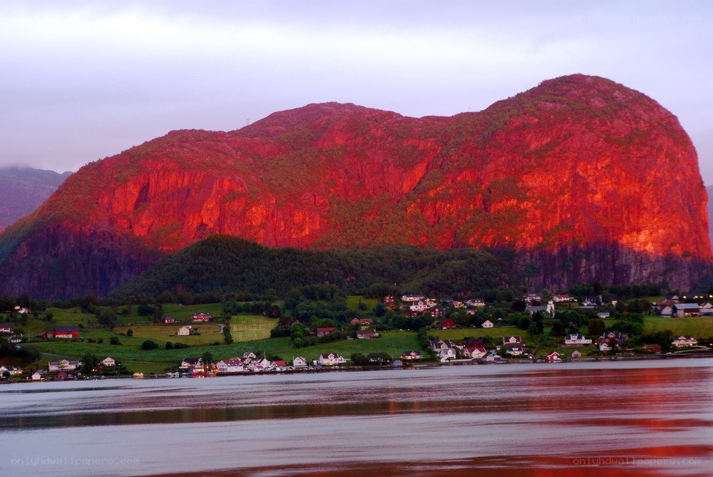 Red-lit mountain at dusk