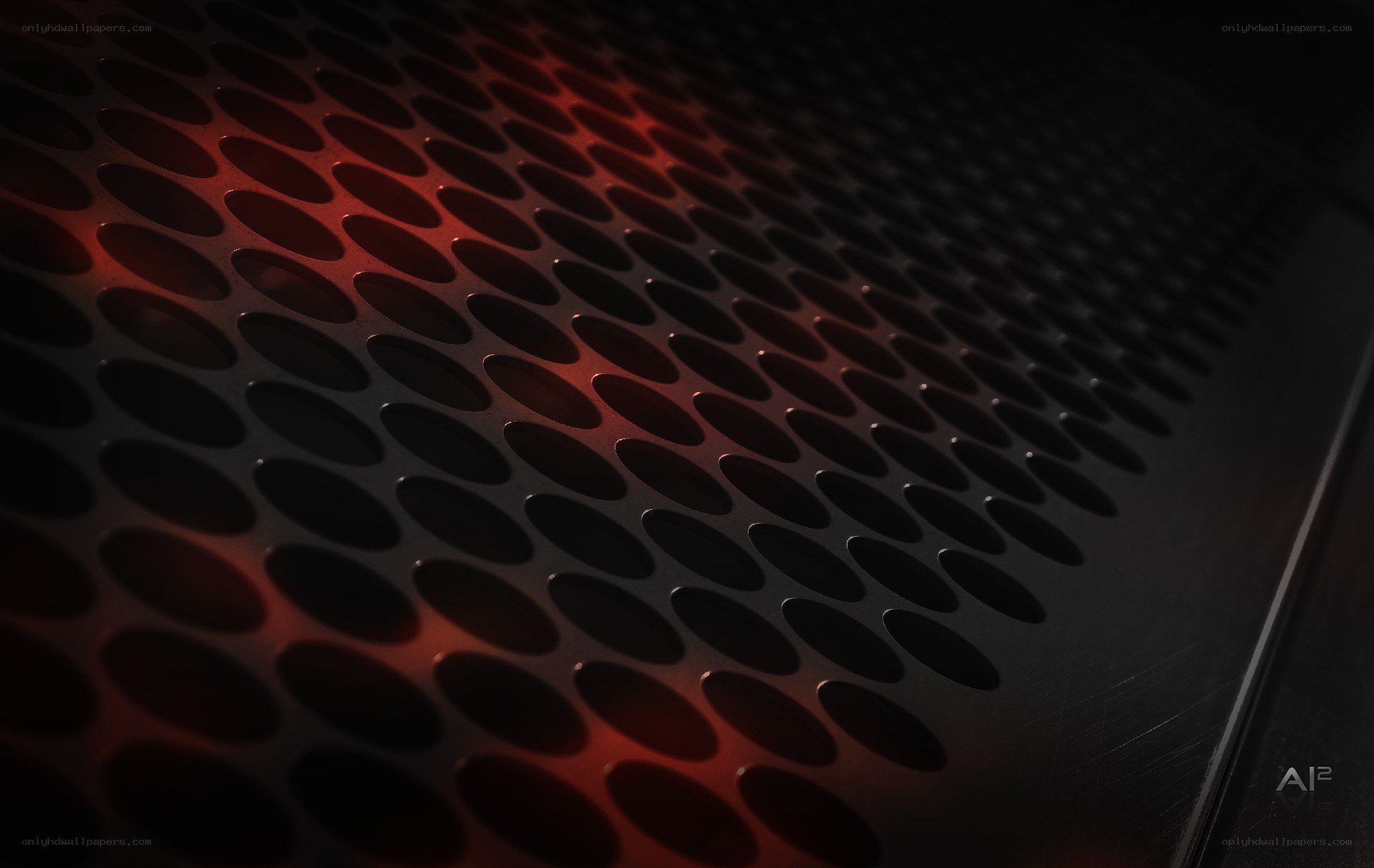 red-lit perforated metal surface