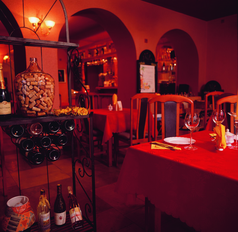 Red-lit restaurant interior