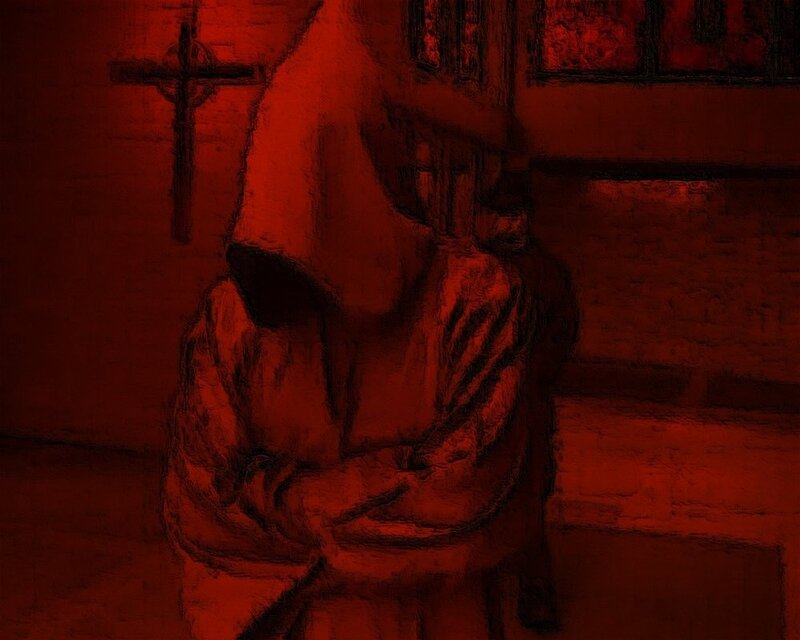 Red-lit statue in a church