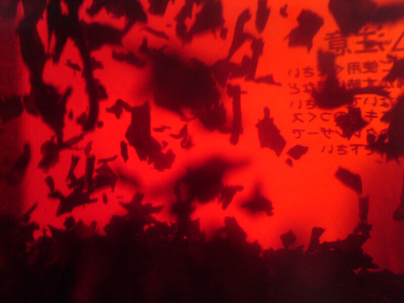 red-lit text with shadows