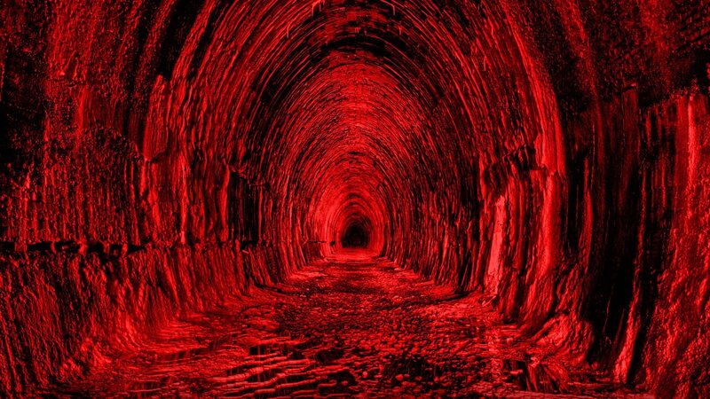 red-lit tunnel interior