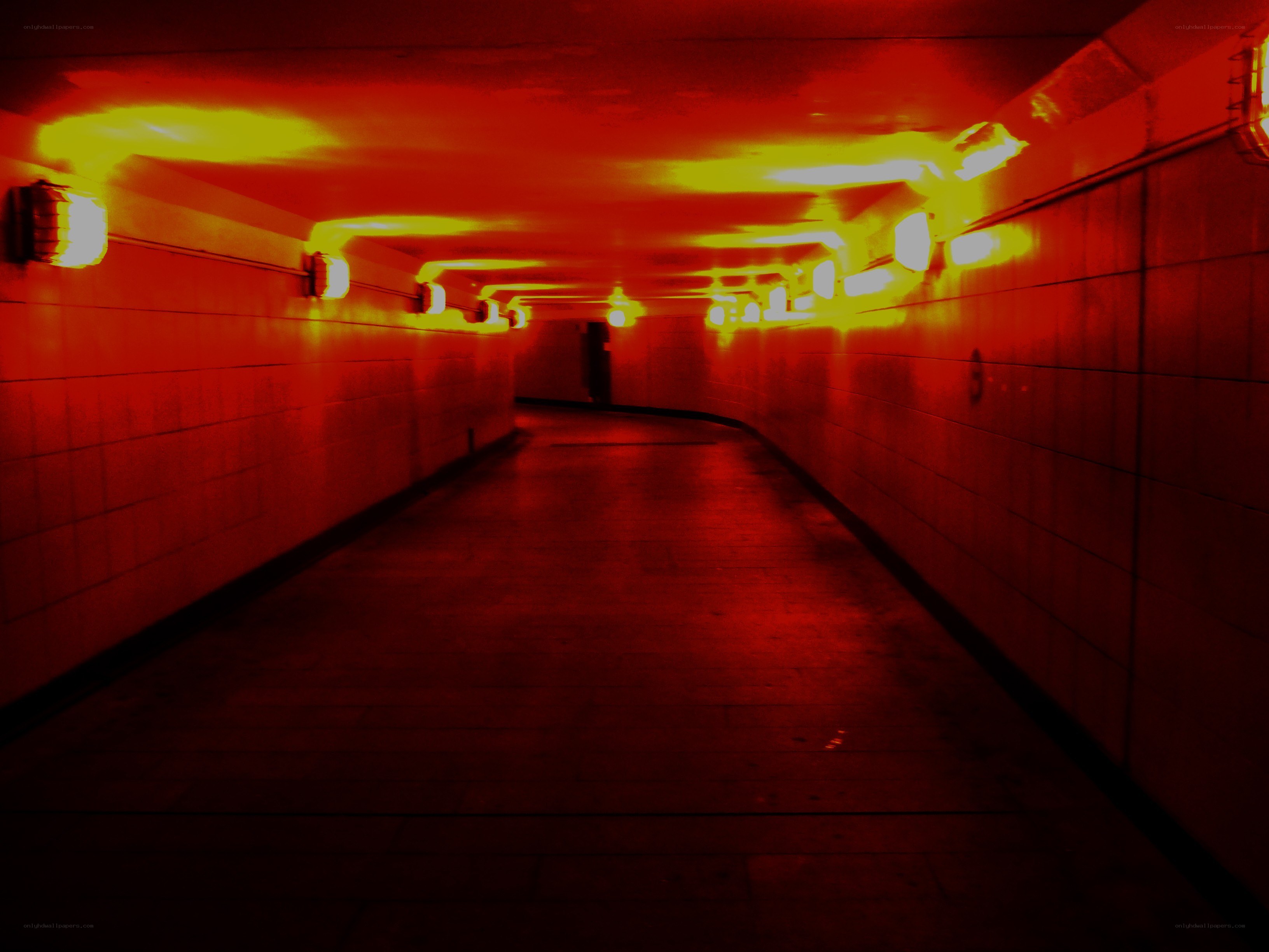 red-lit underground tunnel