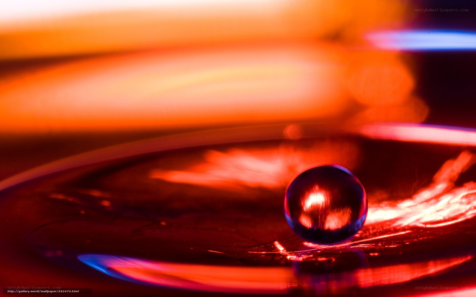 Red-lit water droplet