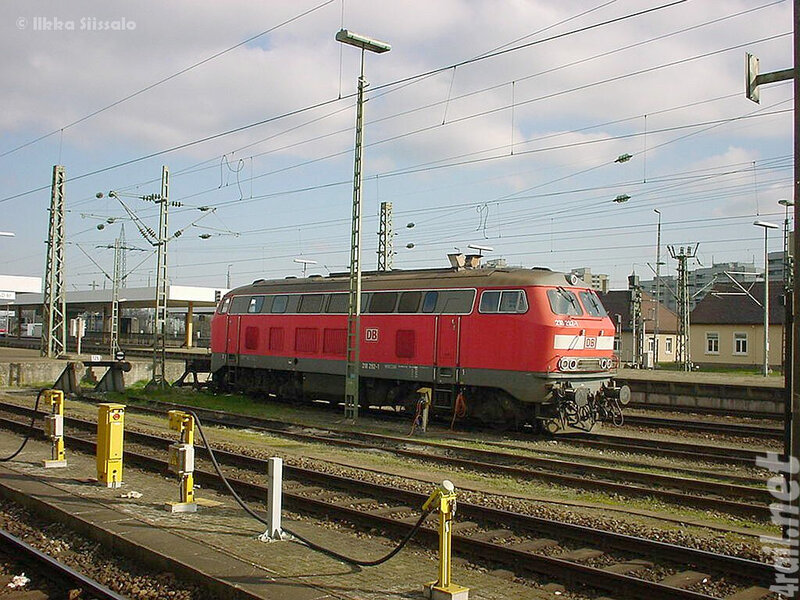 Red Locomotive at Station