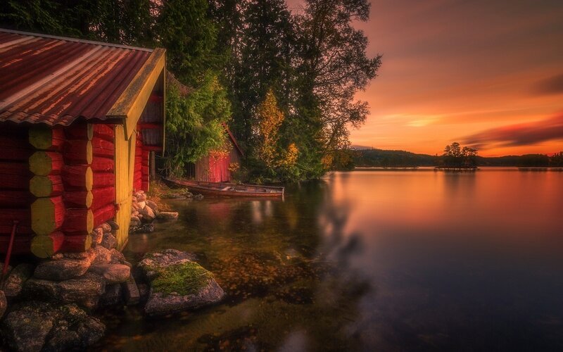 Red Log Cabin by Lake