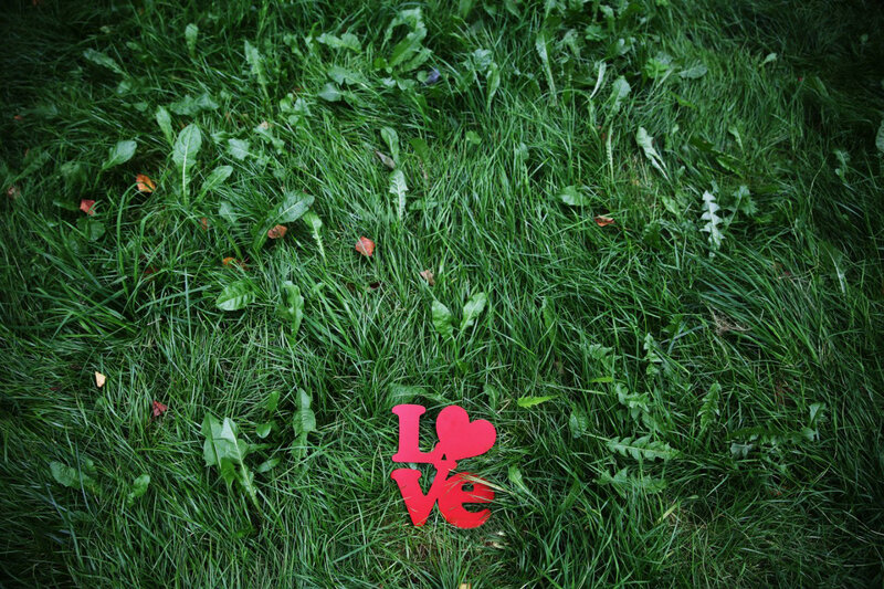 Red Love Sign on Grass